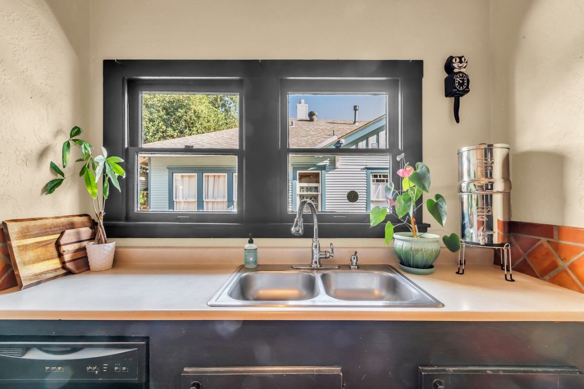 2608 Hopkins Street Houston, TX 77006 - Photo 24 of 35 a kitchen with a sink and a window