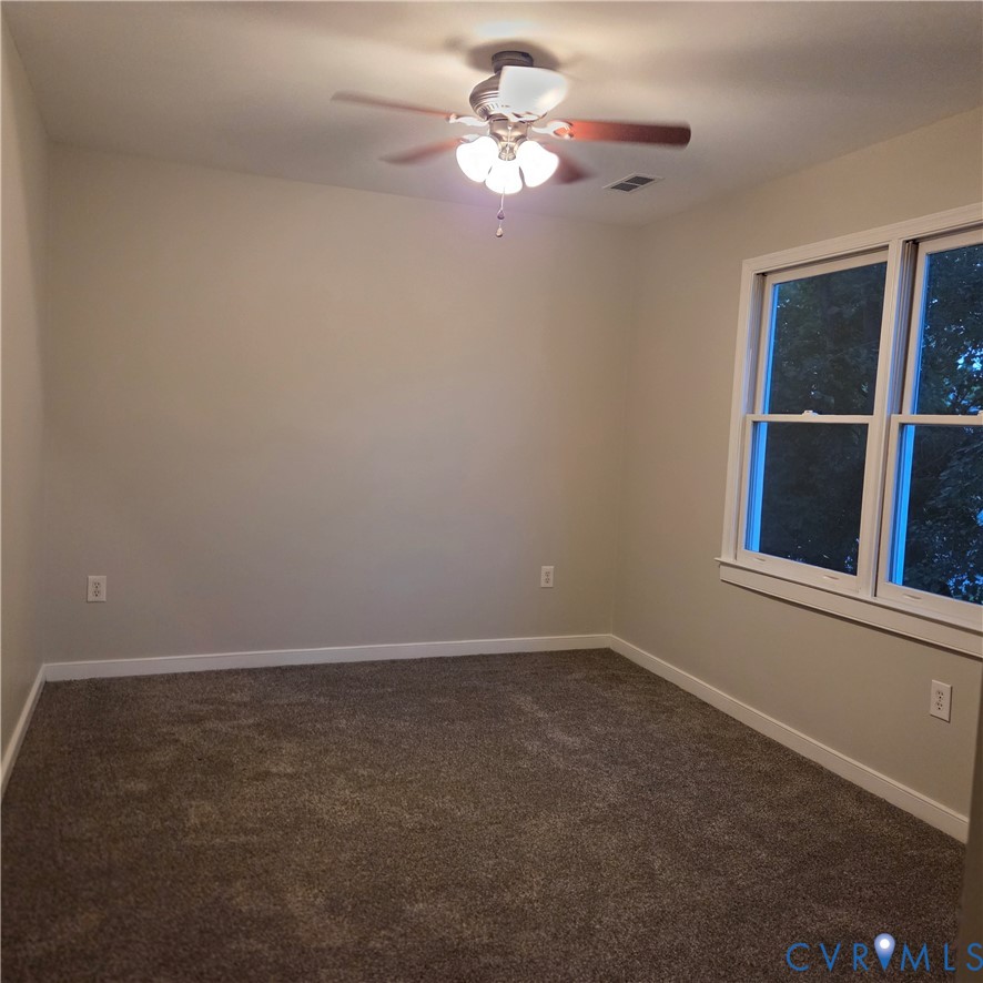 124 Lipscomb Street Richmond, VA 23224 - Photo 8 of 10 Carpeted room featuring a ceiling fan with integra
