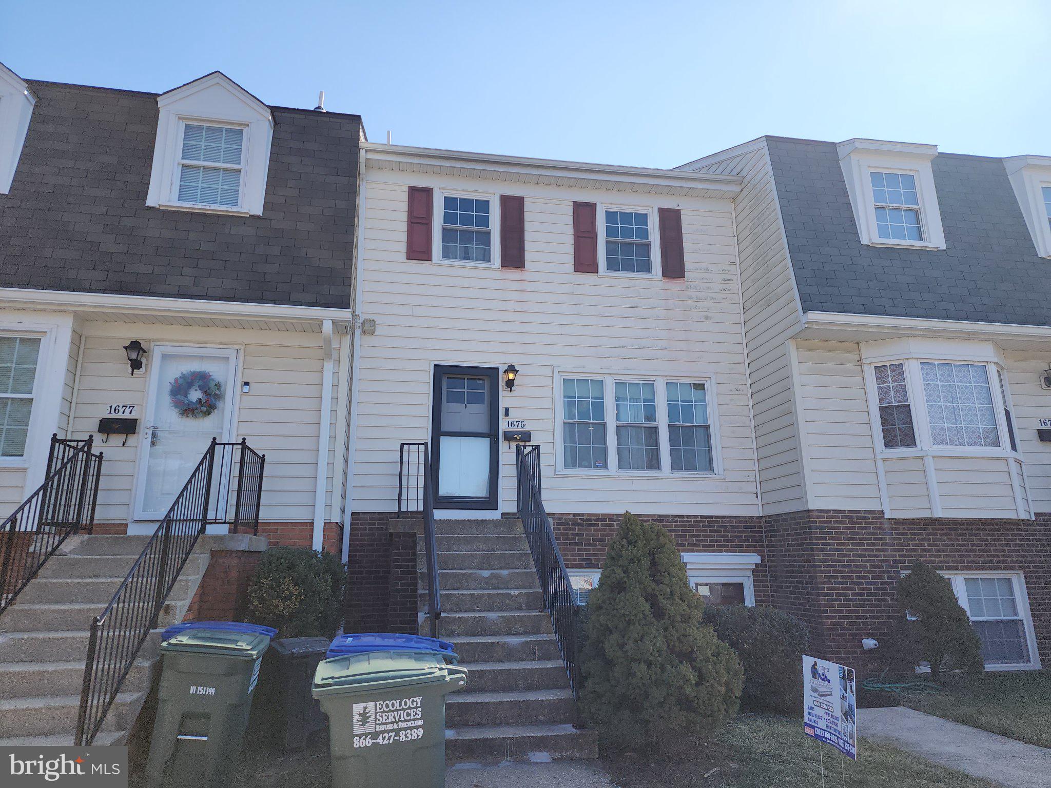 1675 Ridgely Court, Unit 182 Crofton, MD 21114 - Photo 5 of 47 a front view of a house with garden