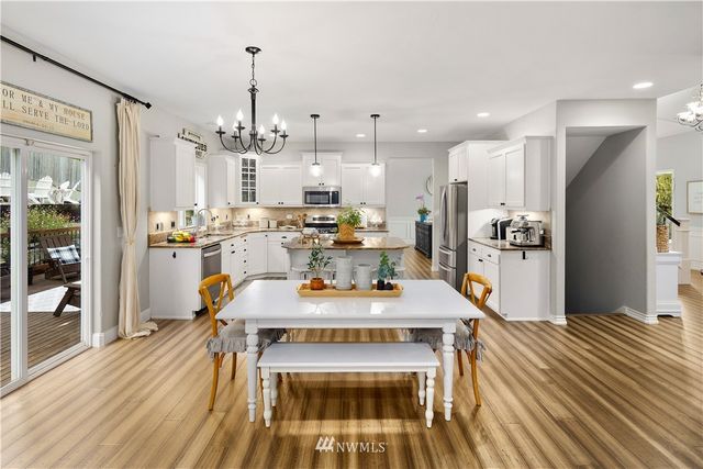 a view of a dining room kitchen and a window