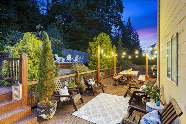 a view of a balcony with furniture