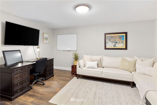 a view of a golf course with a lake