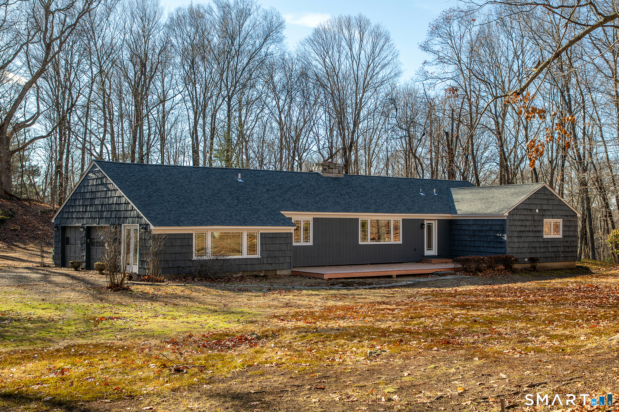 102 Wykeham Road Washington, CT 06793 - Photo 4 of 24 Large 42 x 13 mahogany deck for entertaining.