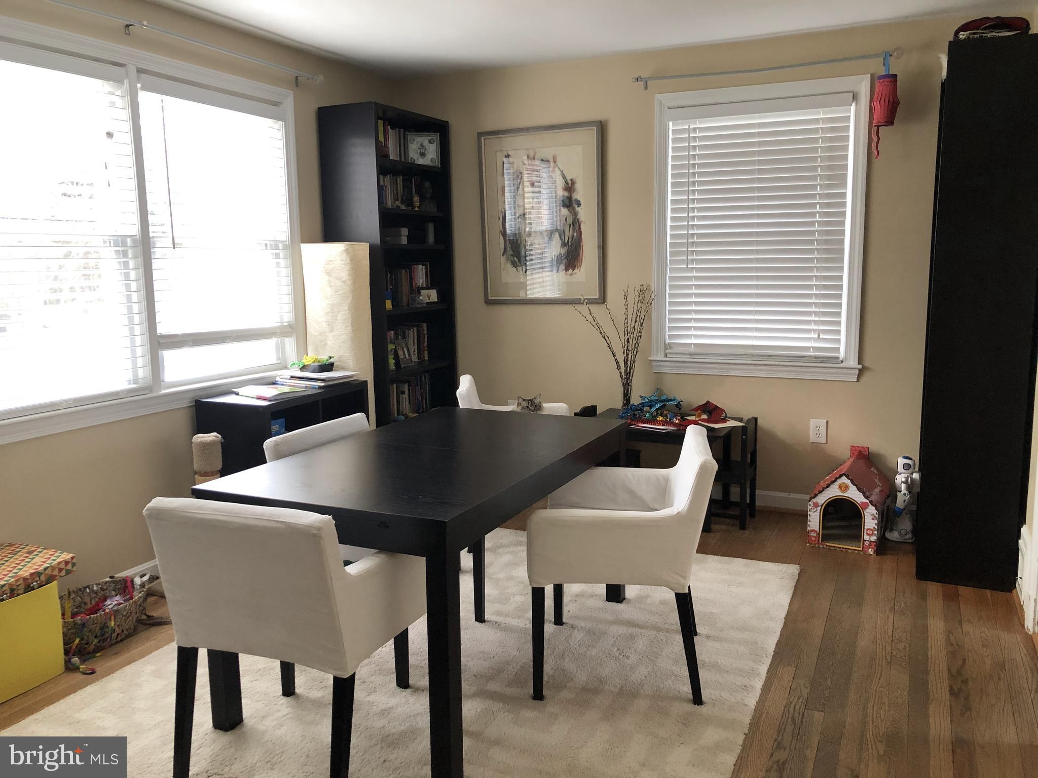 10119 Greeley Avenue Silver Spring, MD 20902 - Photo 2 of 13 a view of a dining room with furniture and window