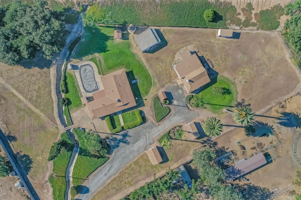2616 Huffstatler Street Fallbrook, CA 92028 - Photo 1 of 1 Aerial view of two houses and outbuildings on the property.