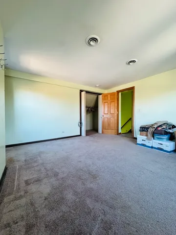 a view of a livingroom with a staircase