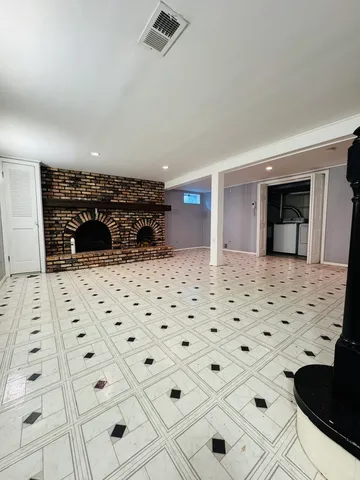 a bathroom with a bathtub and shower