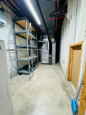 a view of an empty room with empty shelves