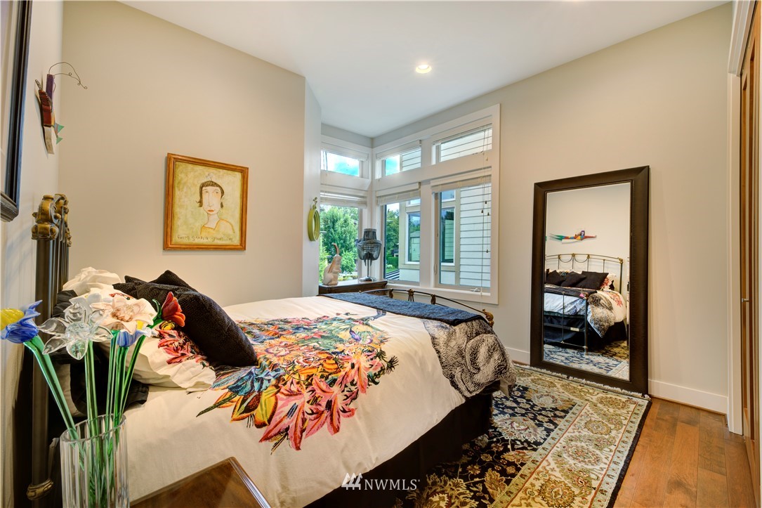 4169 Williams Avenue North Renton, WA 98056 - Photo 15 of 35 a bed sitting in a bedroom next to a window