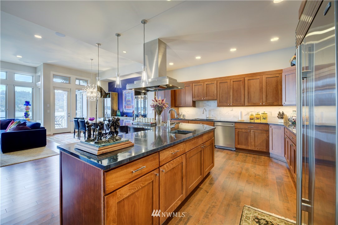 4169 Williams Avenue North Renton, WA 98056 - Photo 3 of 35 a kitchen with counter top space a sink appliances and cabinets