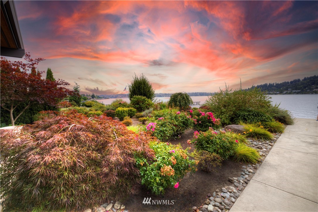 4169 Williams Avenue North Renton, WA 98056 - Photo 22 of 35 a view of a lake with a flower garden