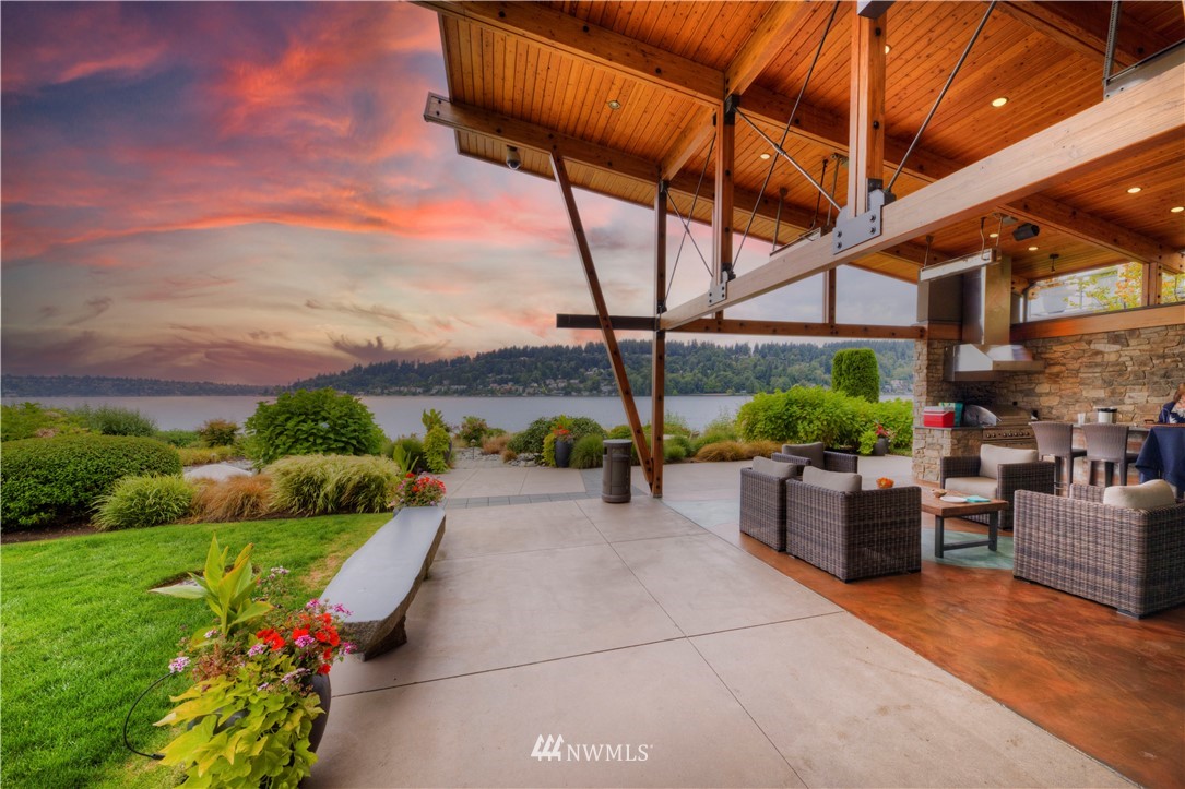 4169 Williams Avenue North Renton, WA 98056 - Photo 32 of 35 a view of a patio with a table and chairs potted plants