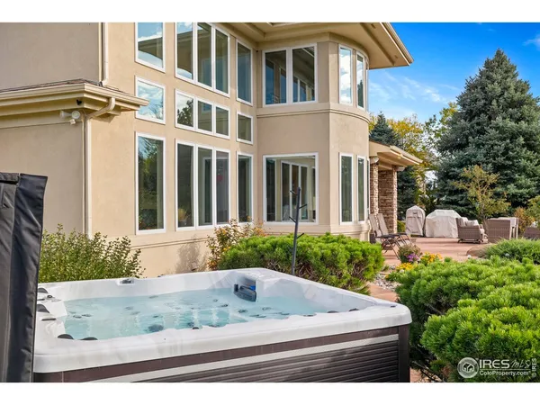 a terrace with outdoor seating and city view
