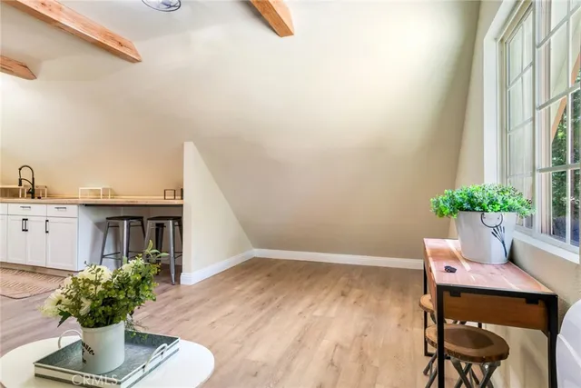 a kitchen with cabinets and sink