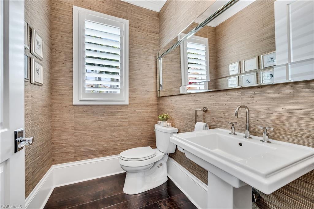 2157 Asti Court Naples, FL 34105 - Photo 22 of 29 Guest powder room