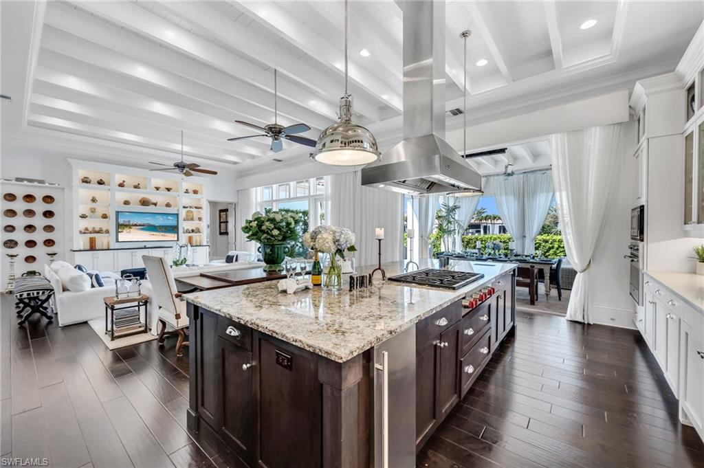 2157 Asti Court Naples, FL 34105 - Photo 3 of 29 Chef's kitchen with high-end appliances and open living concept.