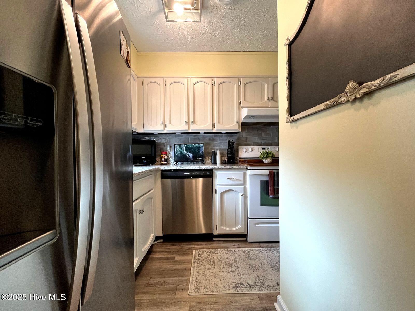 940 Linden Road, Unit 19 Pinehurst, NC 28374 - Photo 5 of 29 940 kitchen 1