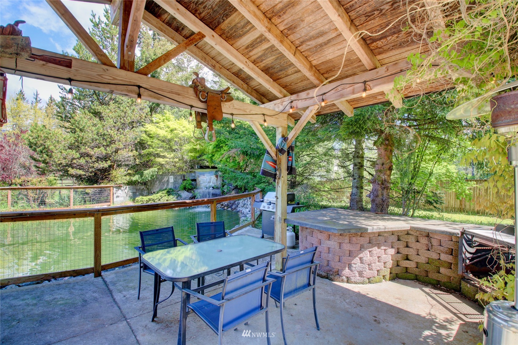 8235 Lusk Road Concrete, WA 98237 - Photo 12 of 40 a view of a chairs and table in the patio