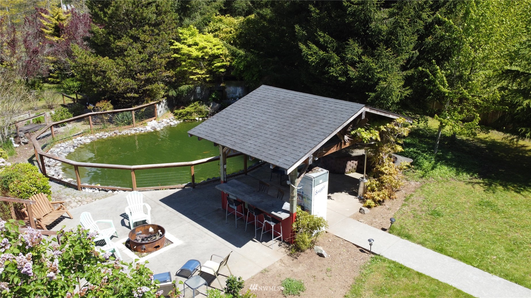 8235 Lusk Road Concrete, WA 98237 - Photo 14 of 40 an aerial view of a house having yard