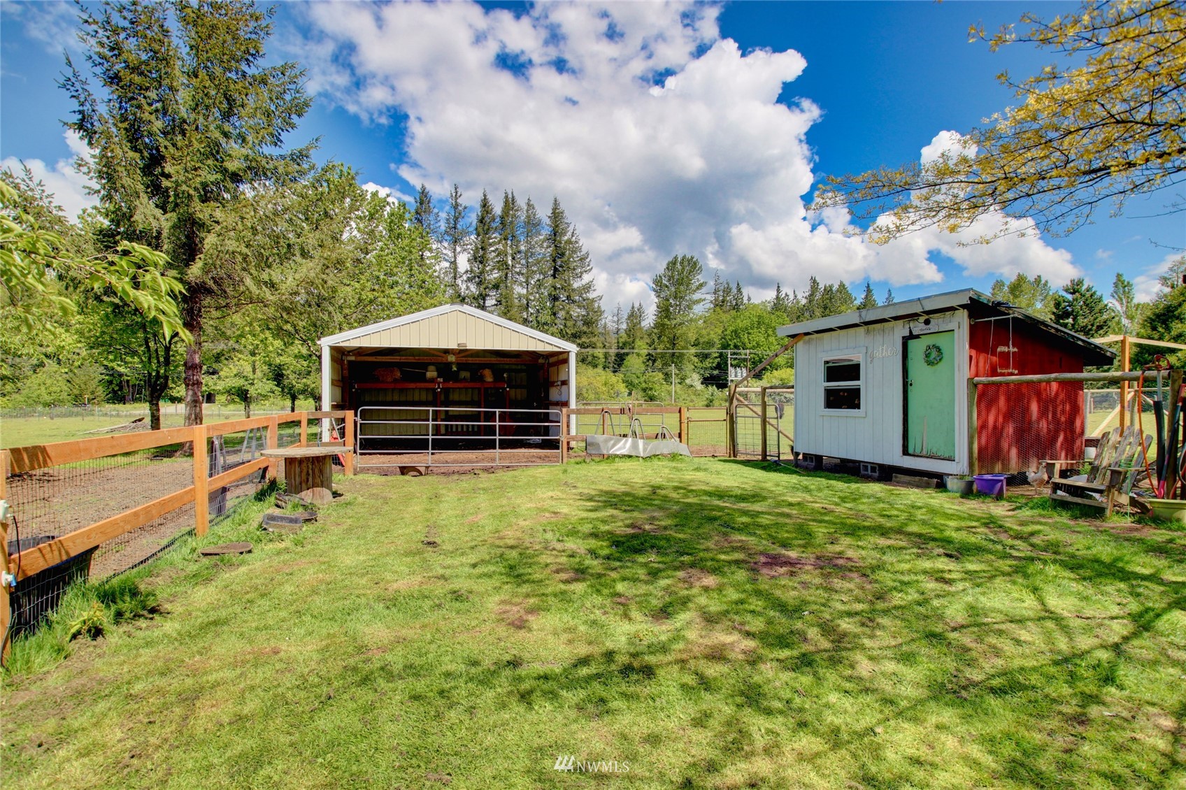 8235 Lusk Road Concrete, WA 98237 - Photo 19 of 40 a front view of a house with garden
