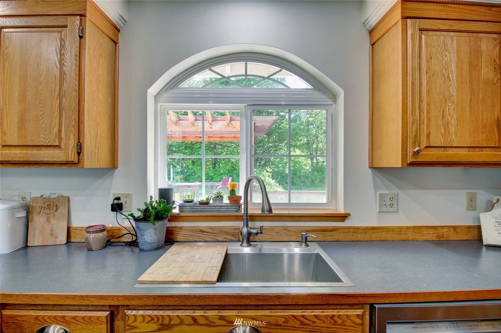 8235 Lusk Road Concrete, WA 98237 - Photo 28 of 40 a kitchen with a sink and a window