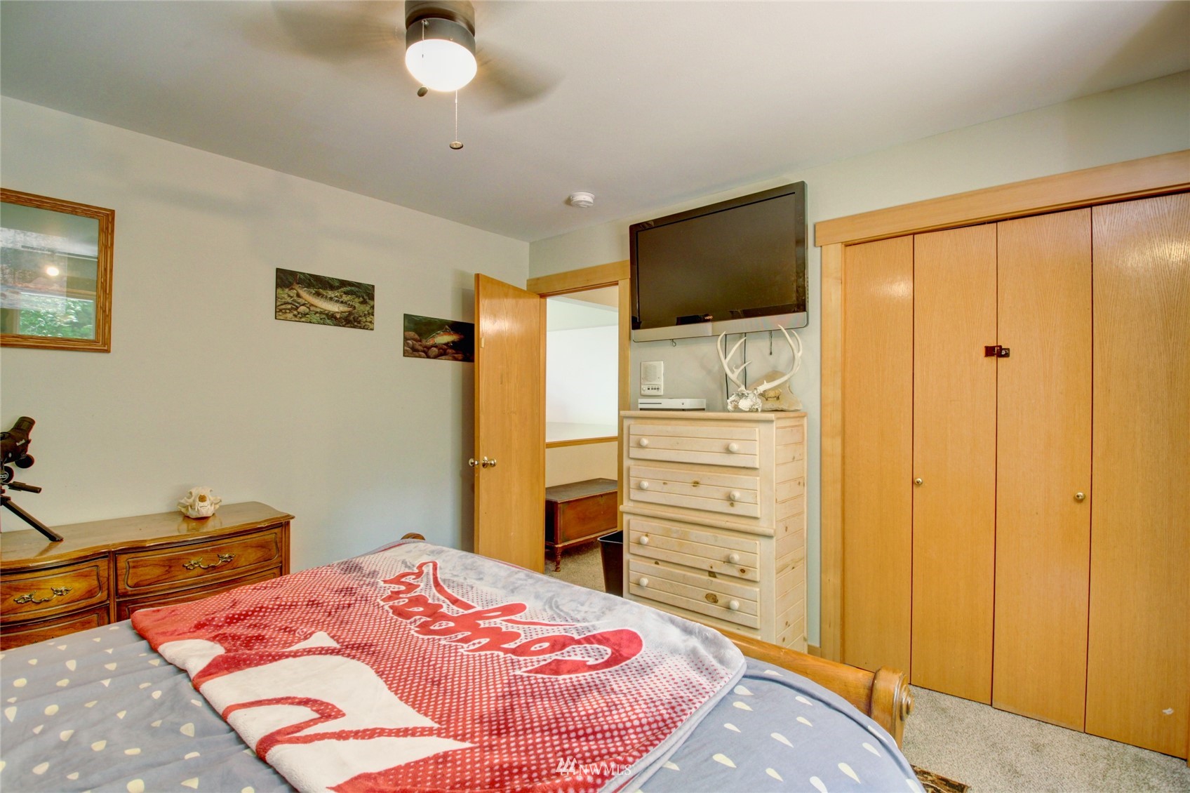 8235 Lusk Road Concrete, WA 98237 - Photo 39 of 40 a bedroom with a bed and a flat screen tv