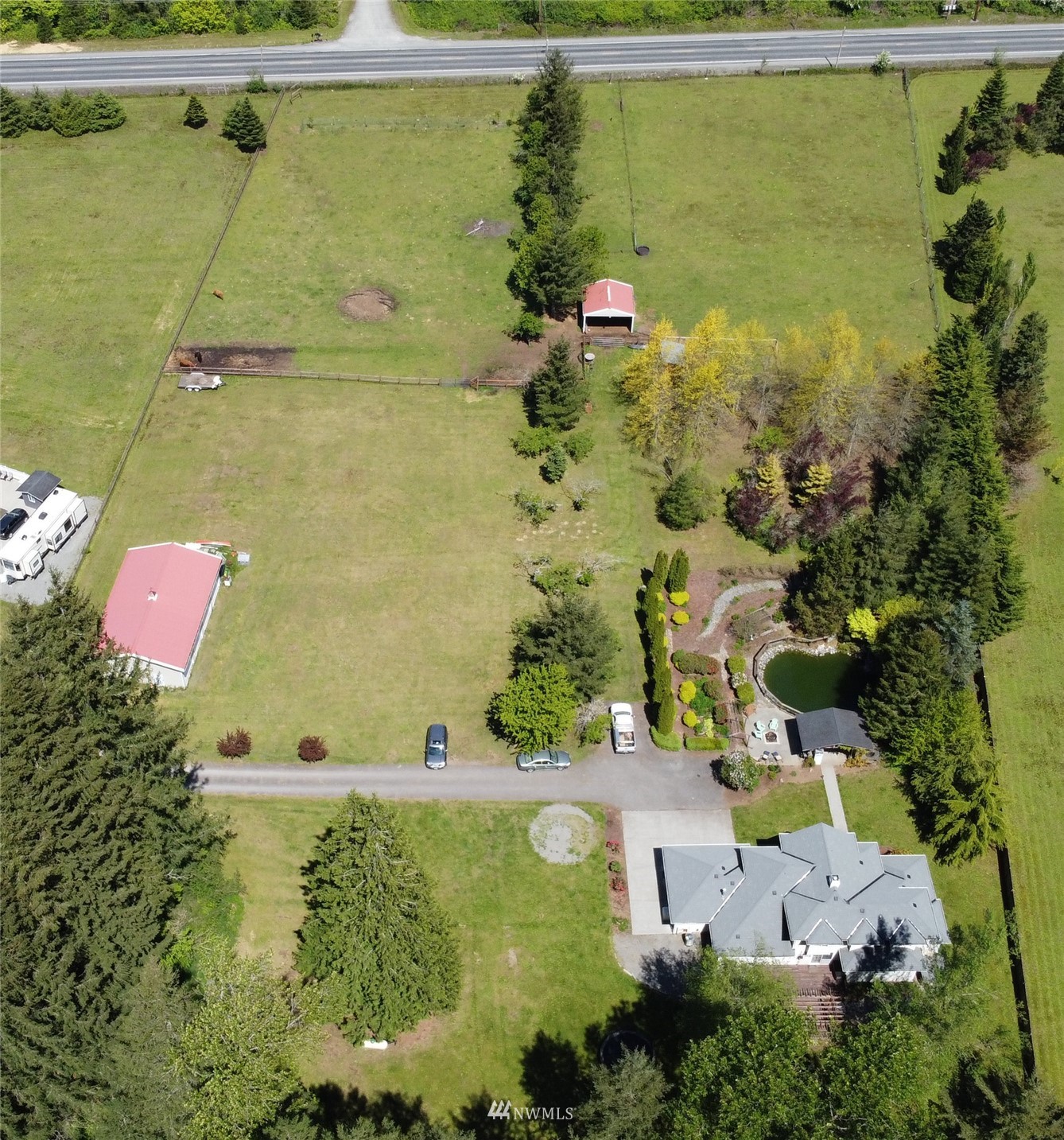 8235 Lusk Road Concrete, WA 98237 - Photo 4 of 40 an aerial view of residential houses with outdoor space
