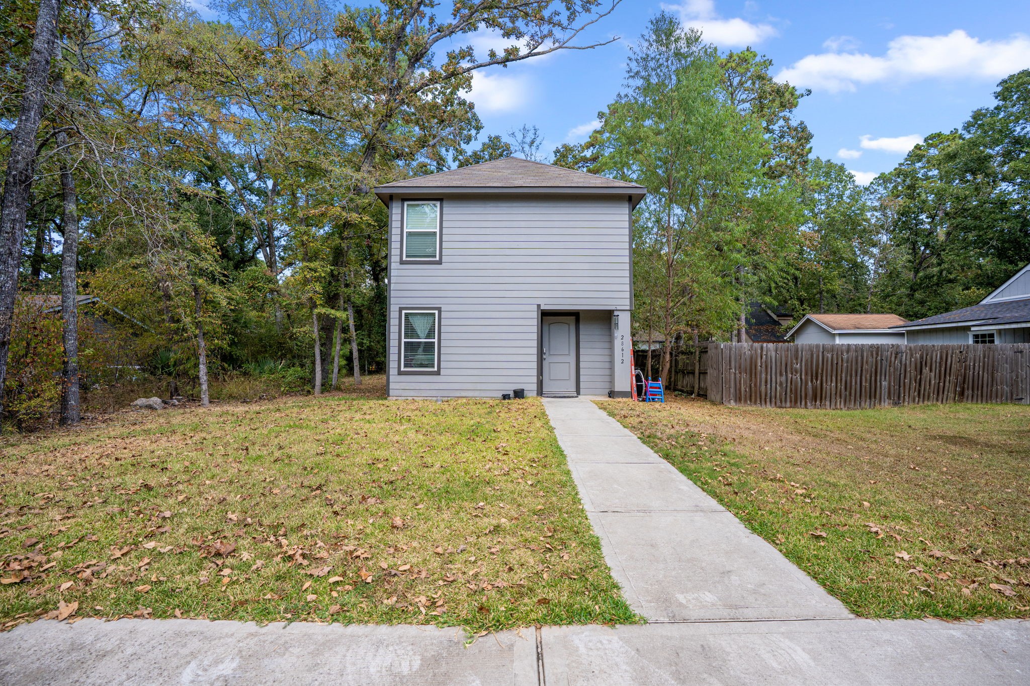 28612 Rantoul Court Point Blank, TX 77364 - Photo 2 of 14 a backyard of a house