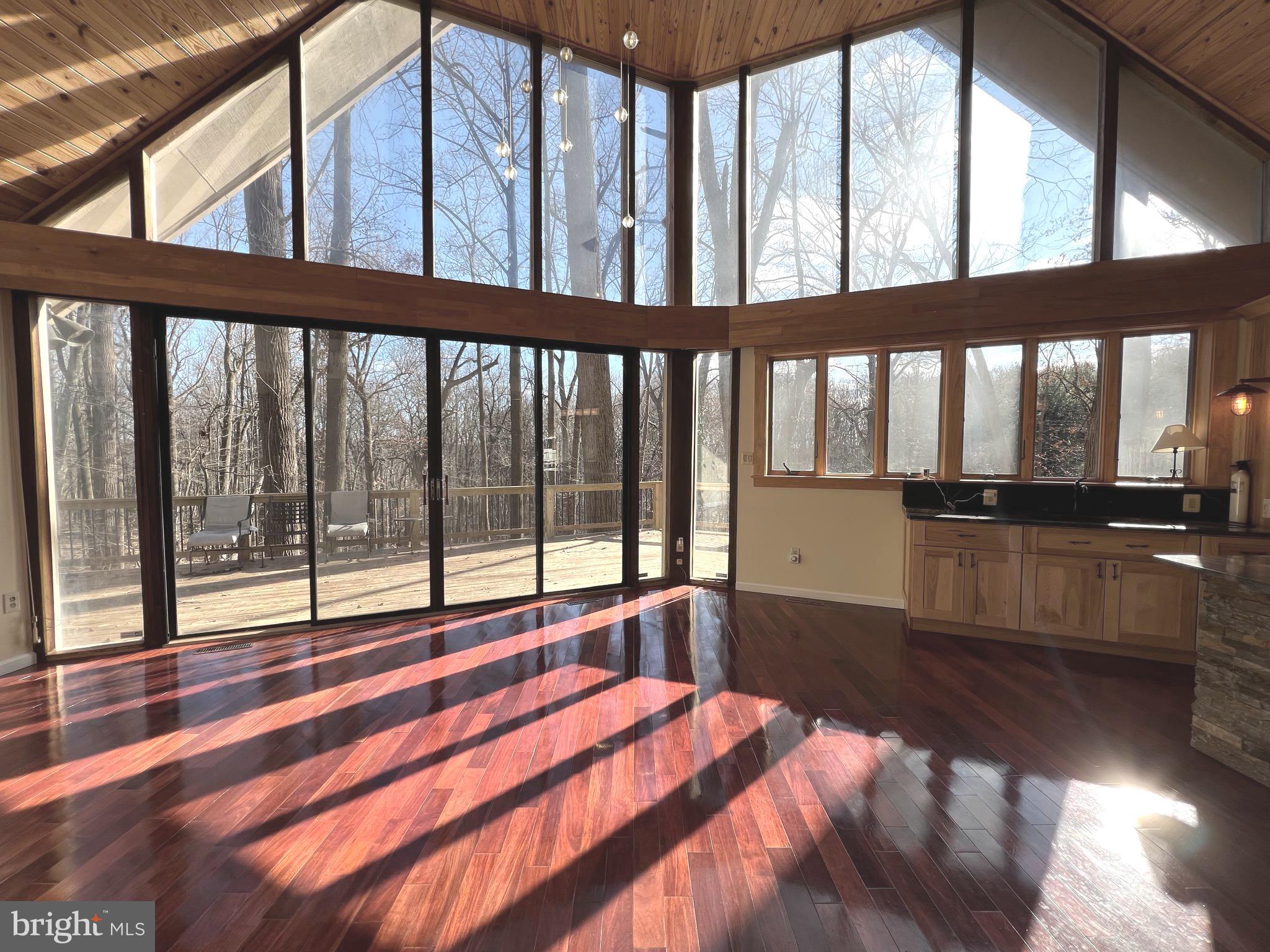 12889 Eagles View Road Phoenix, MD 21131 - Photo 11 of 45 Living/Dining Room with wall of windows