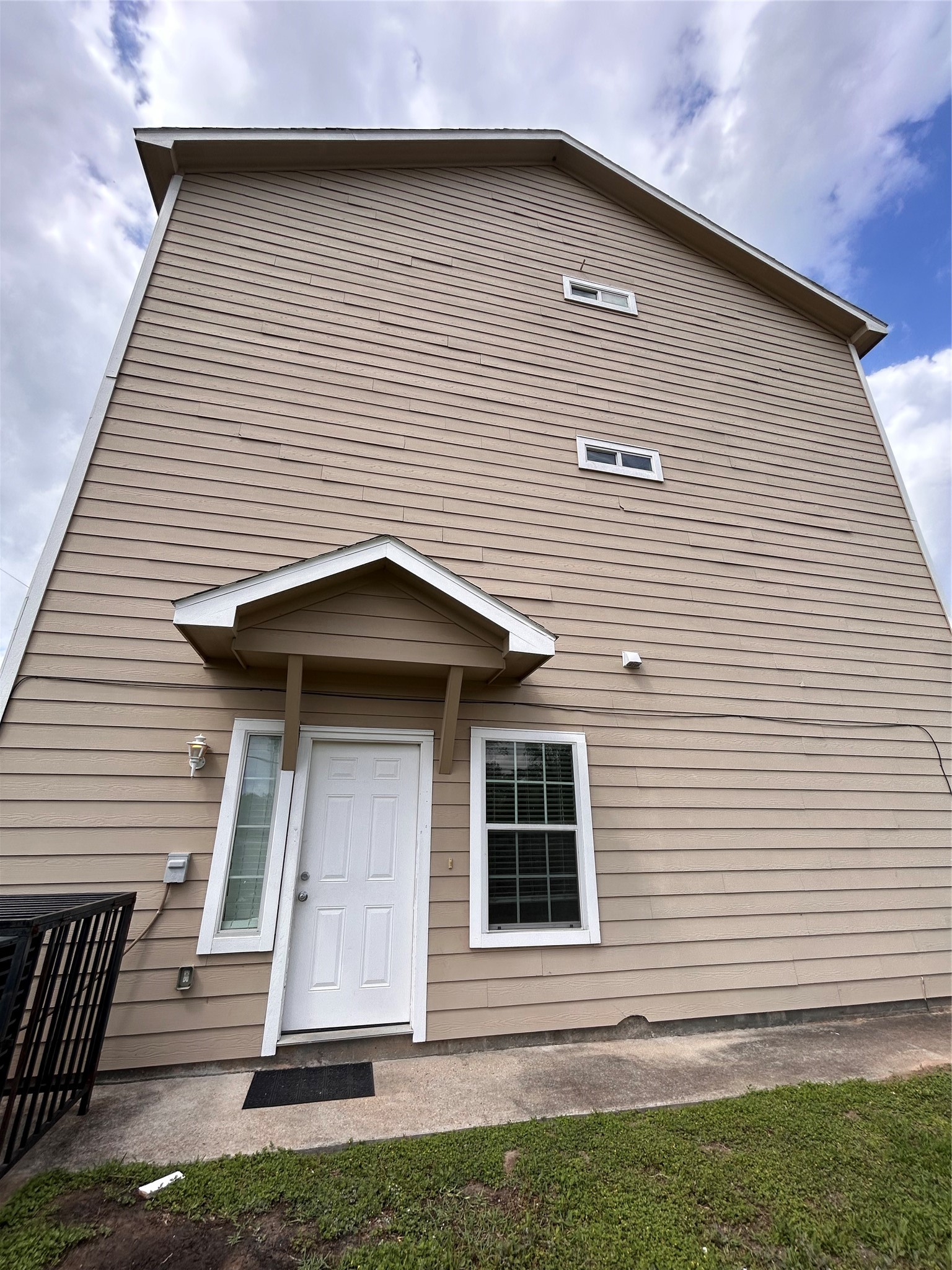 a front view of a house with a garage