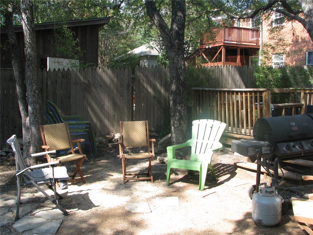 2830 San Gabriel Street, Unit B Austin, TX 78705 - Photo 14 of 14 a view of backyard with outdoor seating and plants