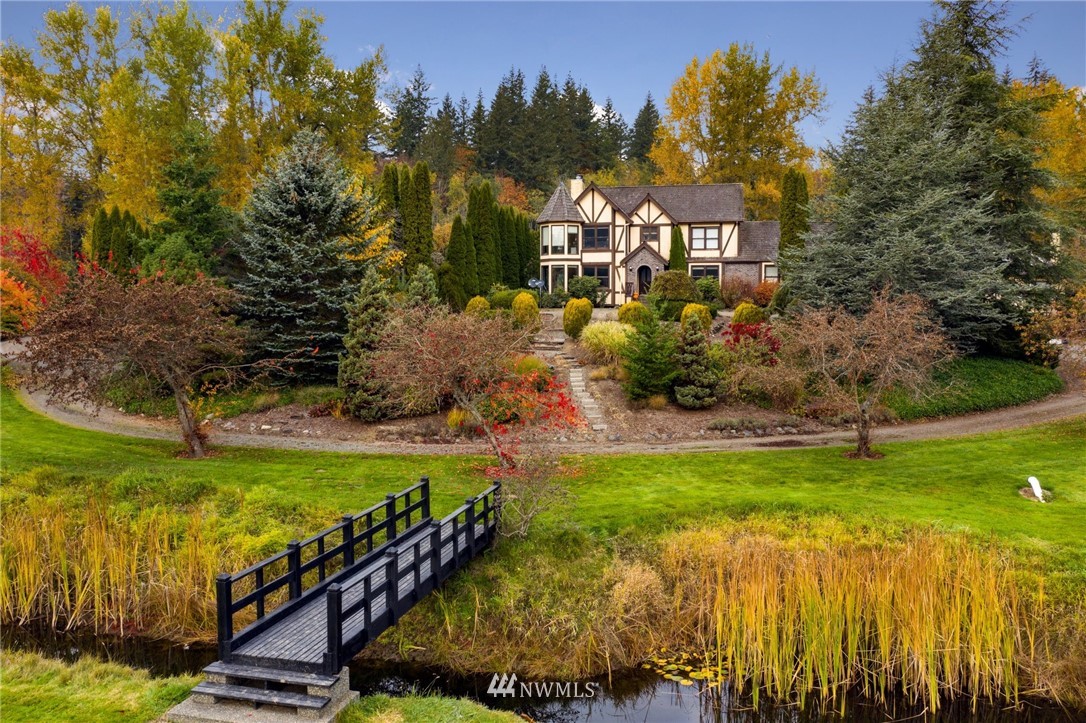 4566 Anderson Way Bellingham, WA 98226 - Photo 2 of 29 a view of a garden with an outdoor space and seating area
