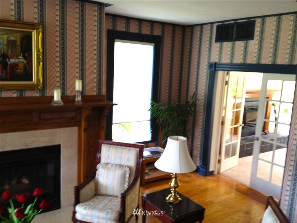 4566 Anderson Way Bellingham, WA 98226 - Photo 13 of 29 a living room with furniture and a fireplace