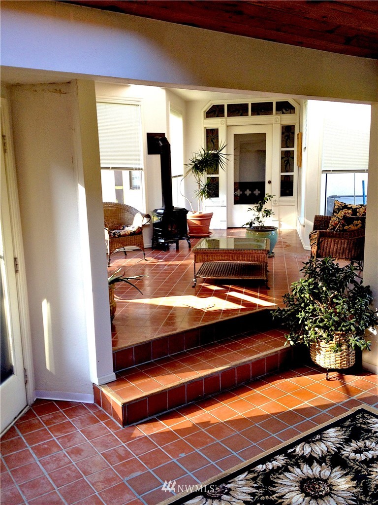 4566 Anderson Way Bellingham, WA 98226 - Photo 16 of 29 a view of kitchen with furniture and flat screen tv