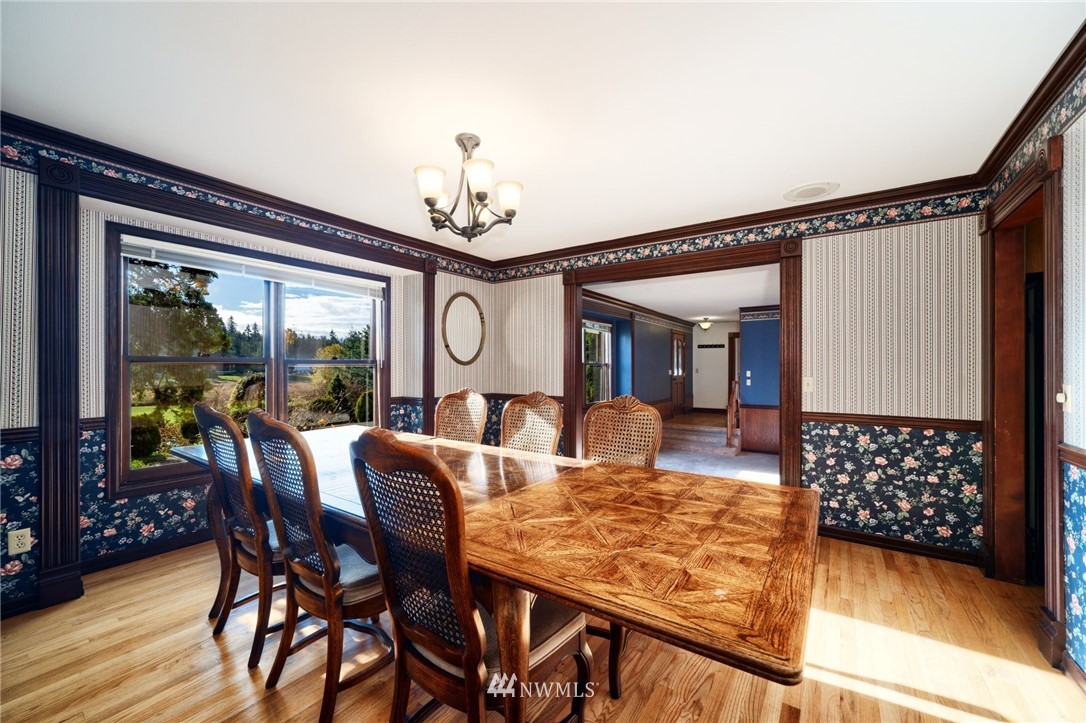 4566 Anderson Way Bellingham, WA 98226 - Photo 20 of 29 a view of a dining room with furniture window and wooden floor