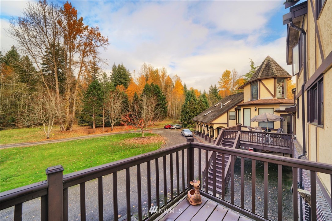 4566 Anderson Way Bellingham, WA 98226 - Photo 27 of 29 a view of a wooden deck and a yard with swimming pool
