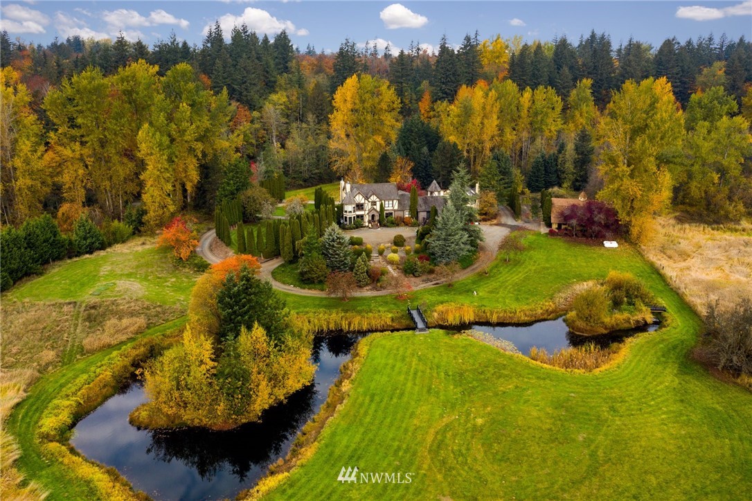 4566 Anderson Way Bellingham, WA 98226 - Photo 29 of 29 a view of a lake in between two of the trees