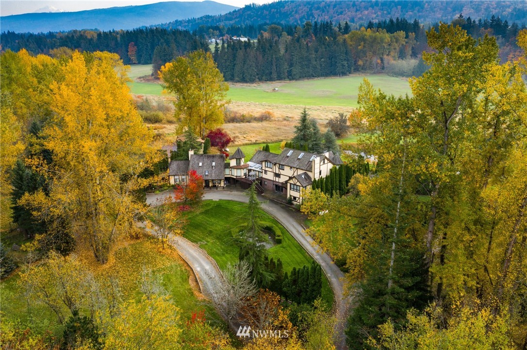 4566 Anderson Way Bellingham, WA 98226 - Photo 10 of 29 a view of a lake with a building in the background