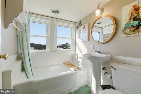 a room with a bed and a window