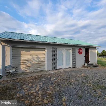 a view of a house with a patio