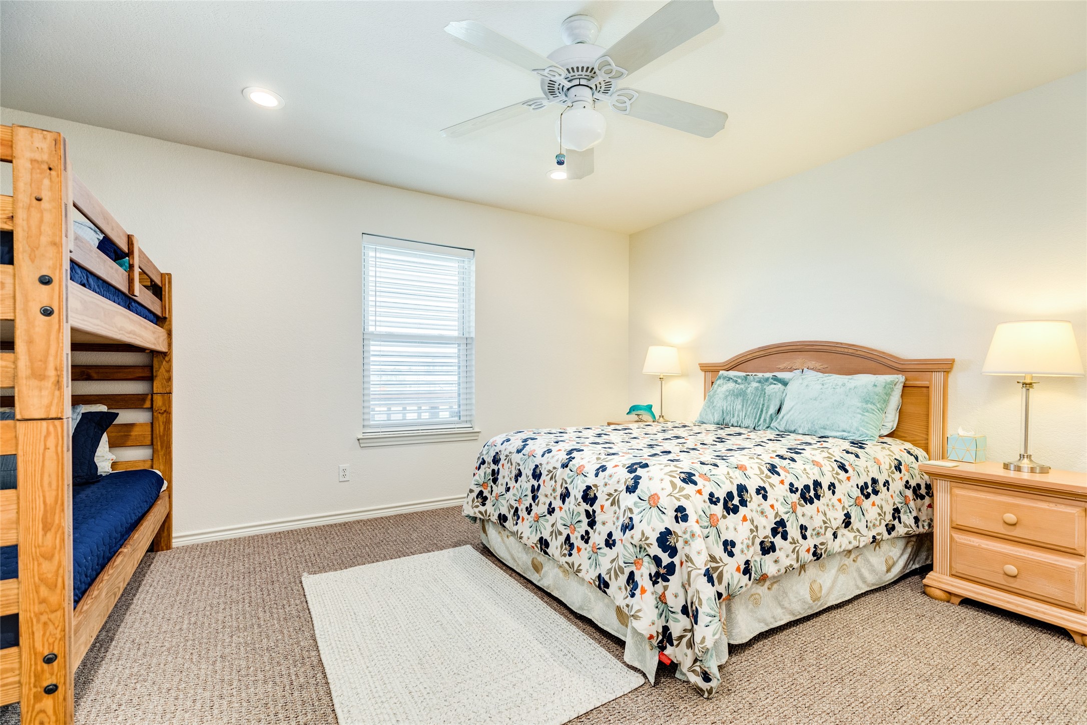 23331 Termini-San Luis Pass Road Galveston, TX 77554 - Photo 16 of 28 a bedroom with a bed and a lamp