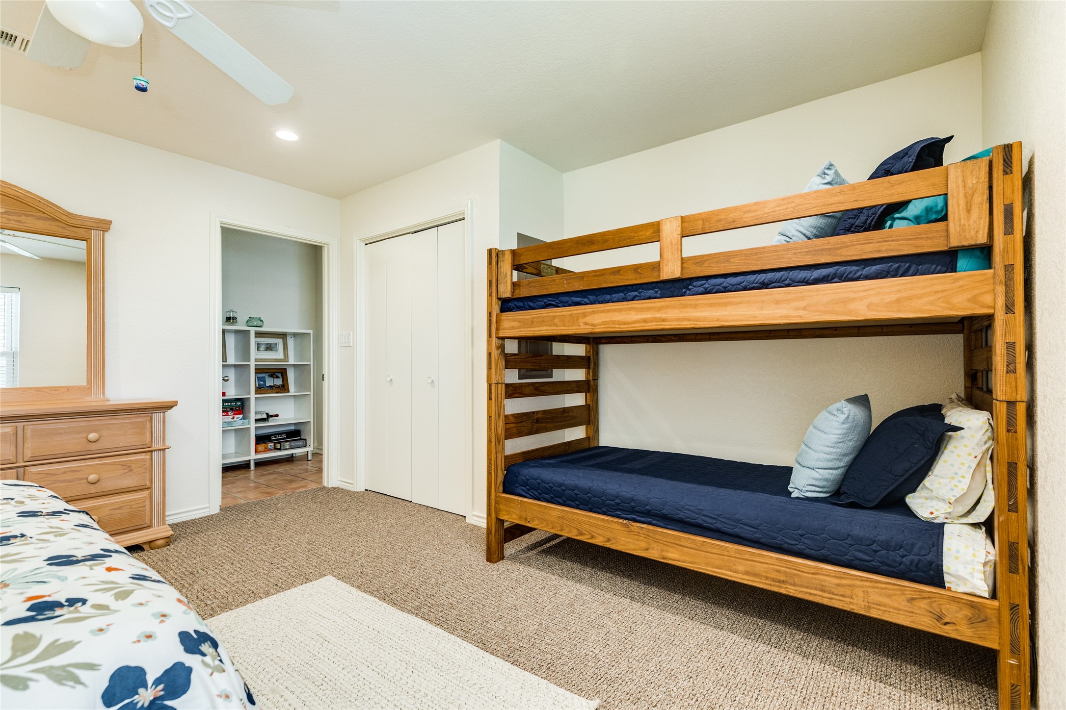 23331 Termini-San Luis Pass Road Galveston, TX 77554 - Photo 17 of 28 a bedroom with a bed and dresser