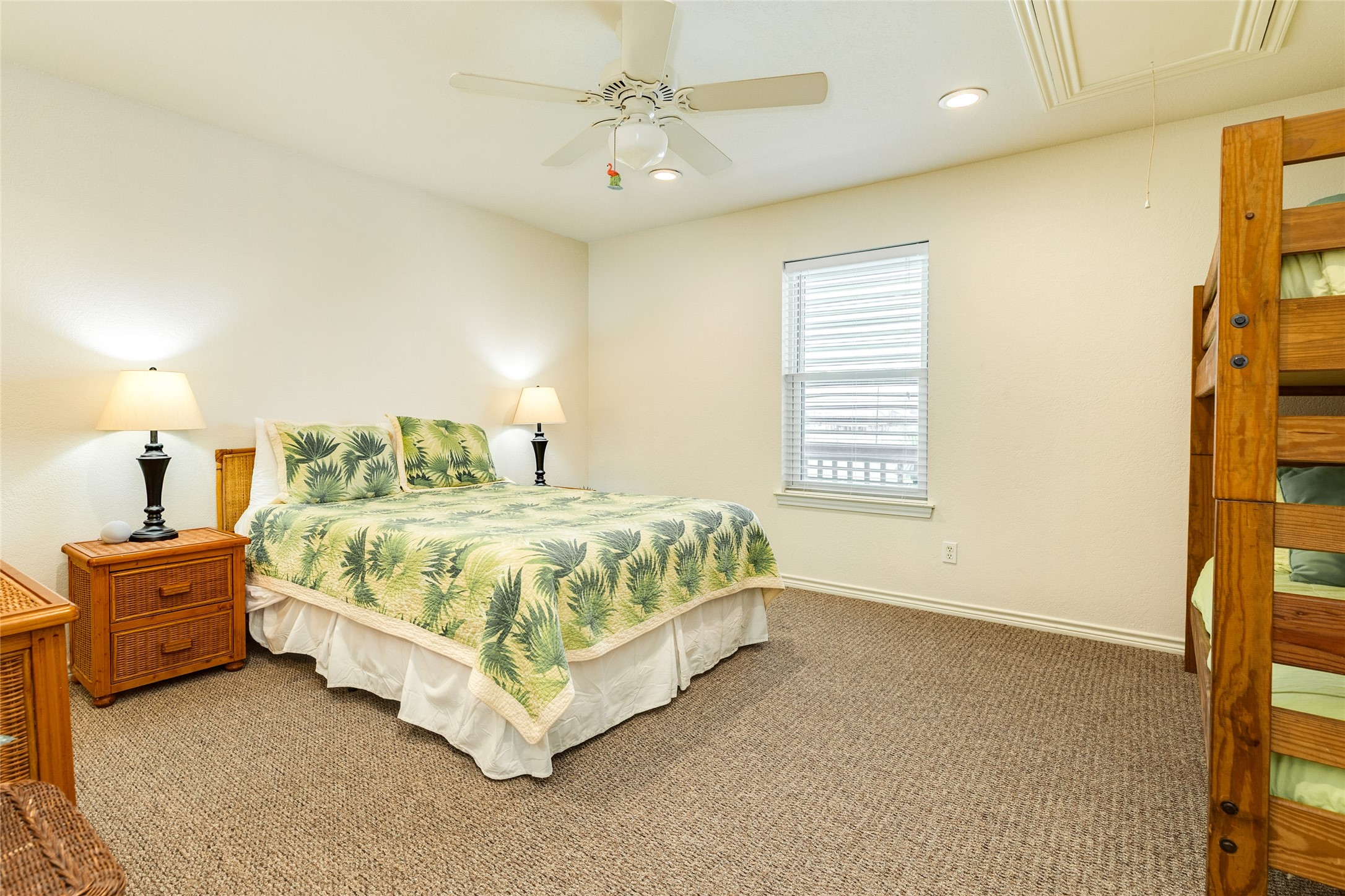 23331 Termini-San Luis Pass Road Galveston, TX 77554 - Photo 19 of 28 a bed sitting in a spacious bedroom next to a window