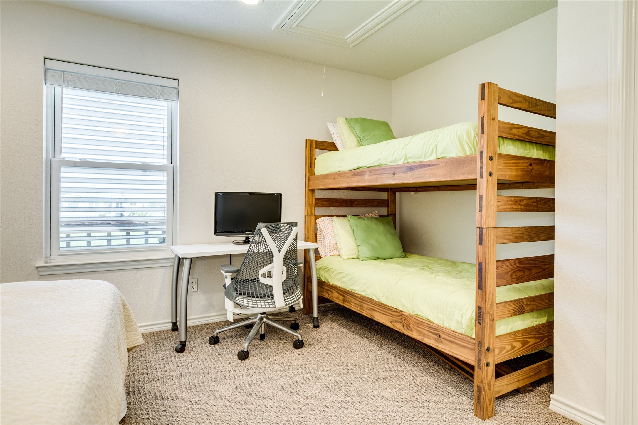 23331 Termini-San Luis Pass Road Galveston, TX 77554 - Photo 20 of 28 a bedroom with a bed and a desk