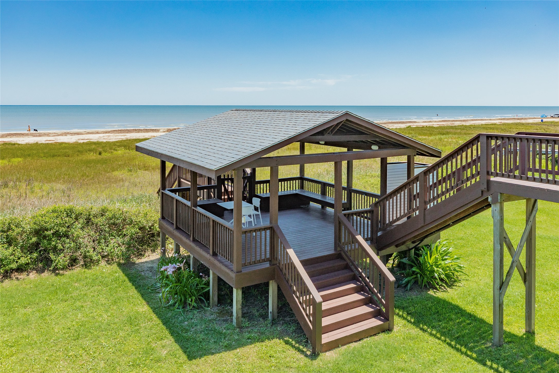 23331 Termini-San Luis Pass Road Galveston, TX 77554 - Photo 25 of 28 a view of a swimming pool with deck and a yard
