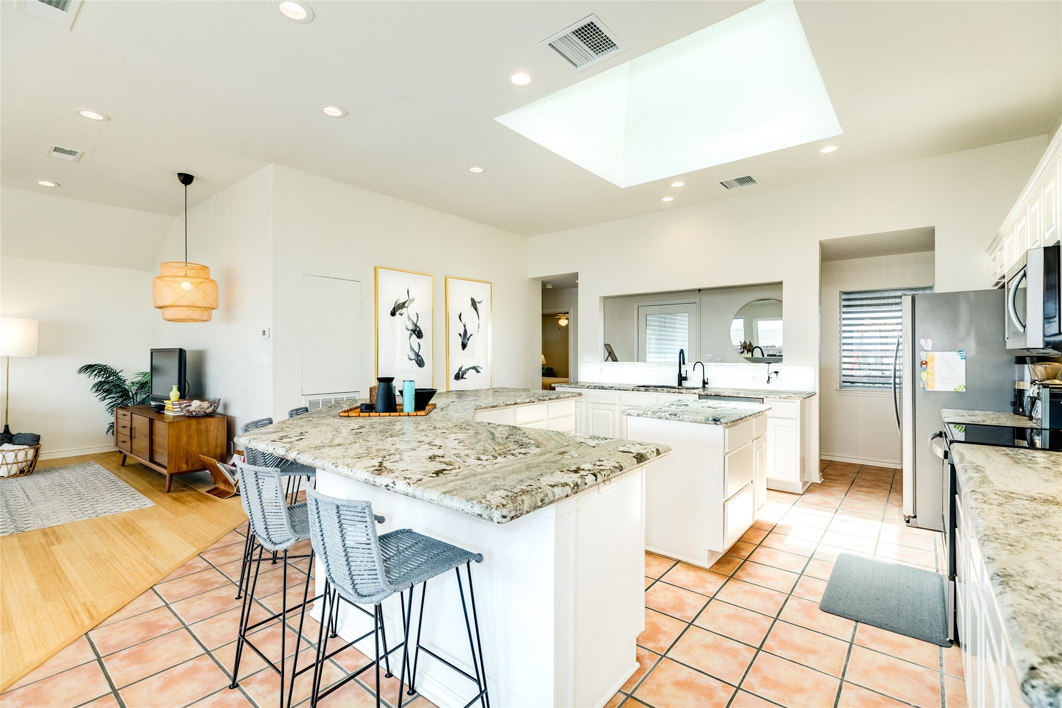 23331 Termini-San Luis Pass Road Galveston, TX 77554 - Photo 9 of 28 a kitchen with a table and chairs in it
