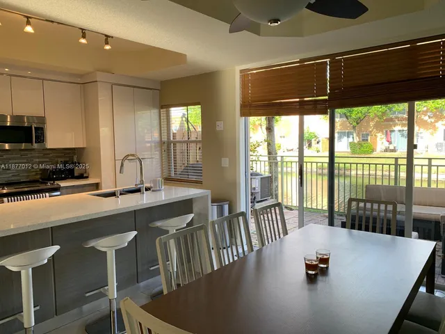 a bedroom with a bed and a lamp