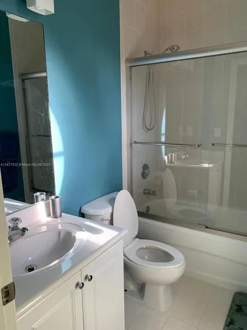 a bathroom with a sink and a toilet
