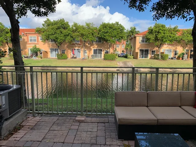 a building outdoor space with patio furniture