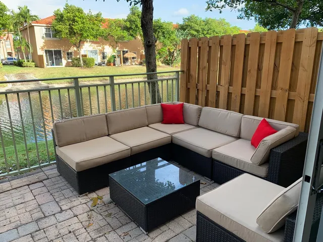 a view of a park with palm trees